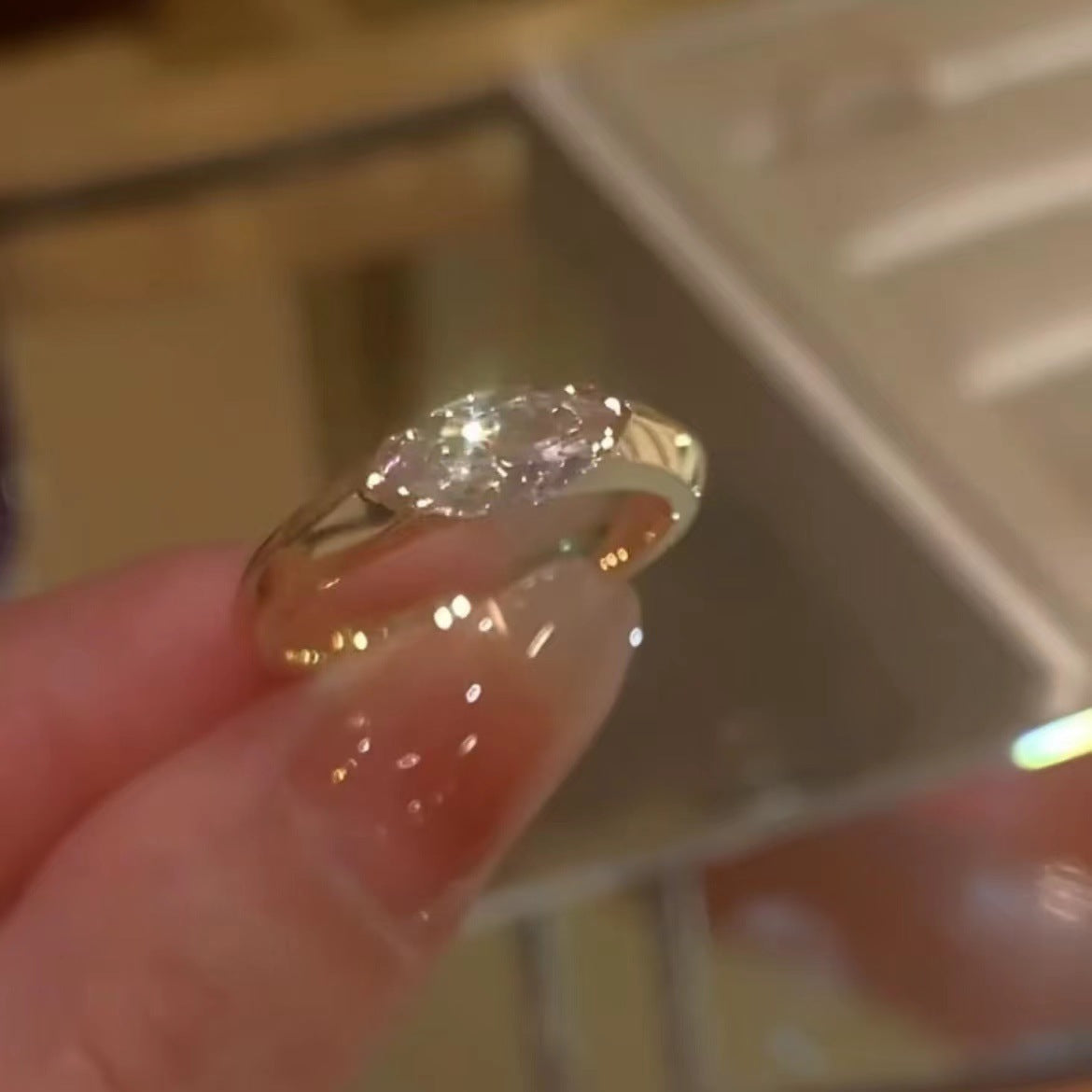 Handcrafted marquise diamond ring—featuring a translucent quality that sparkles brilliantly in sunlight!