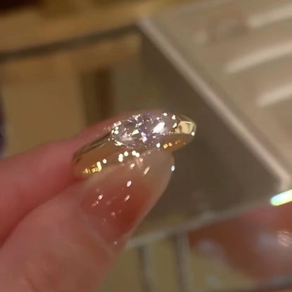 Handcrafted marquise diamond ring—featuring a translucent quality that sparkles brilliantly in sunlight!